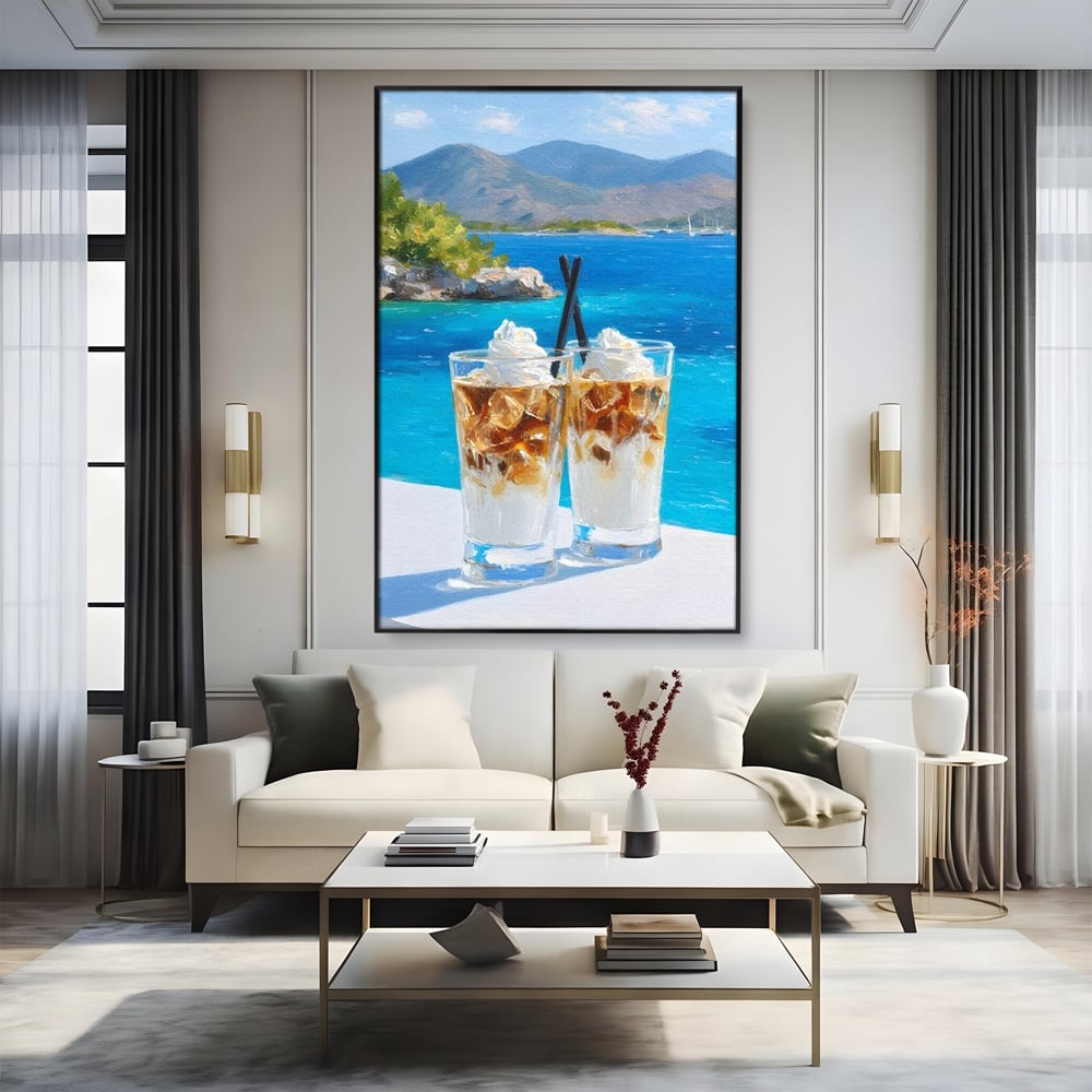 Tablou canvas cu pictura cu doua pahare de frappe pe malul marii, in rama de aluminiu negru, pe perete intr-un living